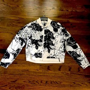 Zip-up windbreaker with pockets